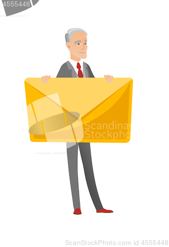 Image of Senior caucasian businessman holding big envelope.