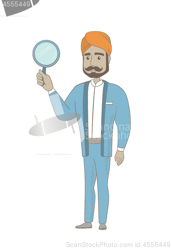 Image of Hindu businessman with magnifying glass.