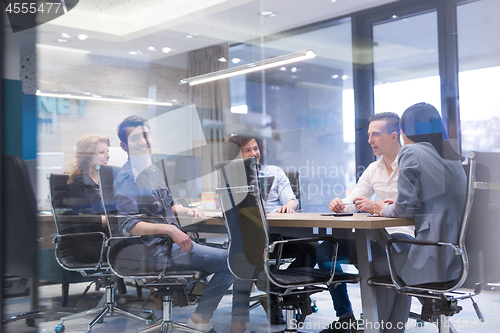 Image of Startup Business Team At A Meeting at modern office building