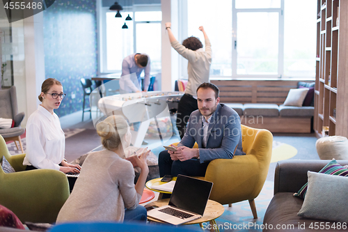 Image of Startup Business Team At A Meeting at modern office building