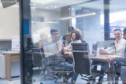 Image of Startup Business Team At A Meeting at modern office building