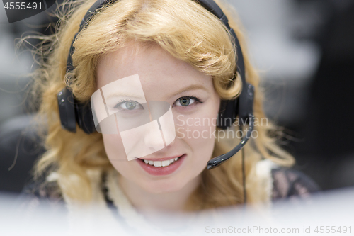 Image of female call centre operator doing her job