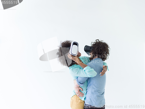 Image of multiethnic couple getting experience using VR headset glasses