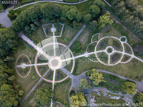 Image of Park alleys of round shape in the botanical garden. The photo from the drone is strictly from above.