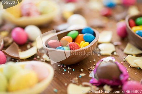 Image of chocolate easter eggs and candy drops on table