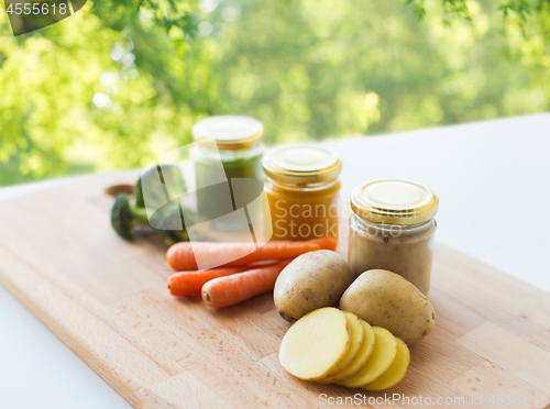 Image of vegetable puree or baby food in glass jars