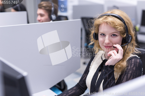 Image of female call centre operator doing her job