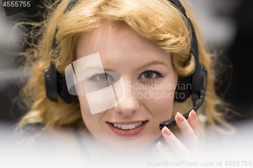 Image of female call centre operator doing her job