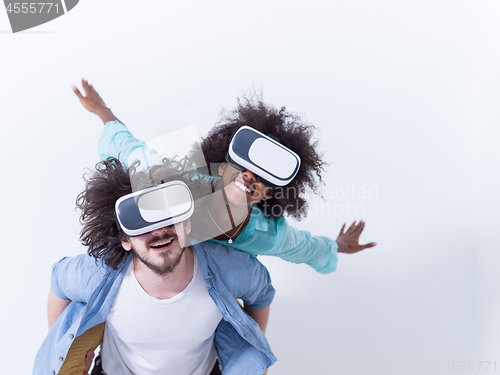 Image of multiethnic couple getting experience using VR headset glasses