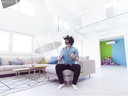 Image of man using VR-headset glasses of virtual reality