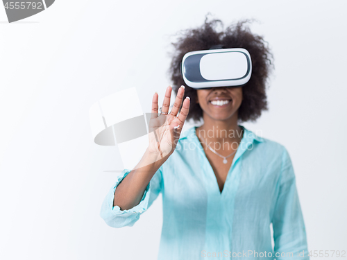 Image of black girl using VR headset glasses of virtual reality