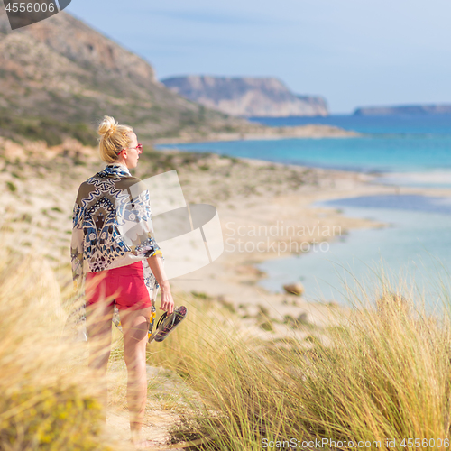 Image of Free Happy Woman Enjoying Sun on Vacations.