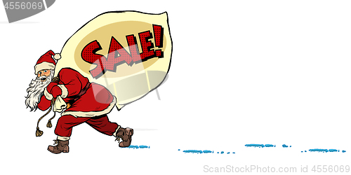 Image of Christmas sale business concept. Santa with a bag of gifts. Christmas and New year