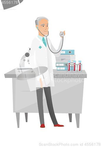 Image of Senior caucasian doctor holding a stethoscope.