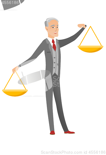 Image of Caucasian businessman holding balance scale.