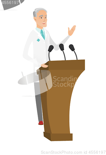 Image of Caucasian doctor giving a speech from tribune.