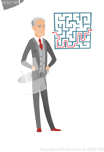 Image of Businessman looking at labyrinth with solution.