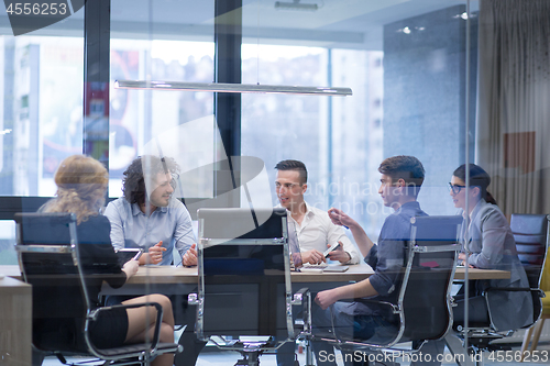 Image of Startup Business Team At A Meeting at modern office building