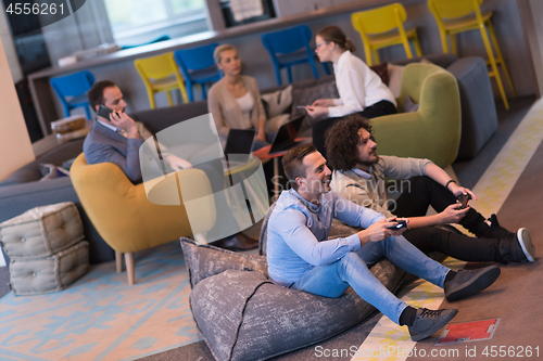 Image of startup Office Workers Playing computer games