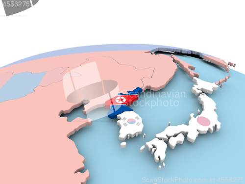 Image of Flag of North Korea on bright globe