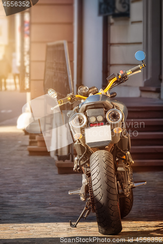 Image of a motorcycle rear view in the city