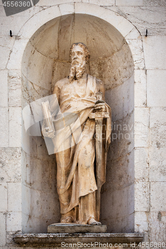 Image of ancient stone Saint Paul statue at Assisi Marche Italy