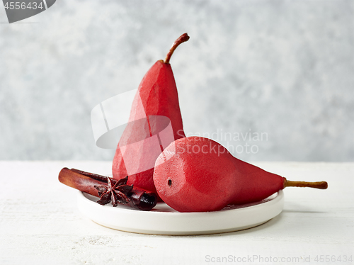 Image of Pears poached in red wine