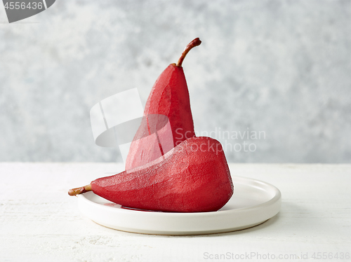 Image of Pears poached in red wine