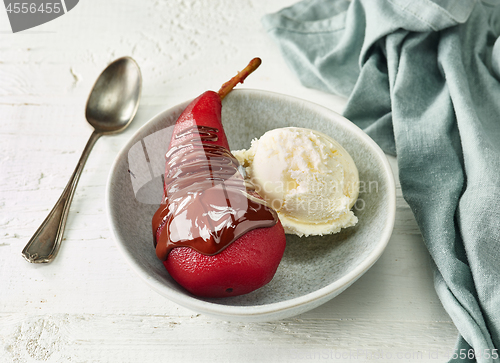 Image of Pear poached in red wine