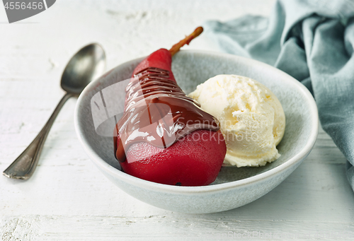 Image of Pear poached in red wine