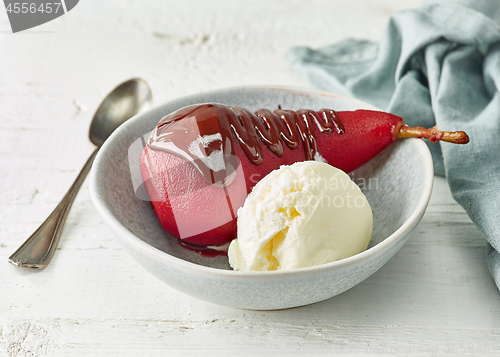 Image of Pear poached in red wine