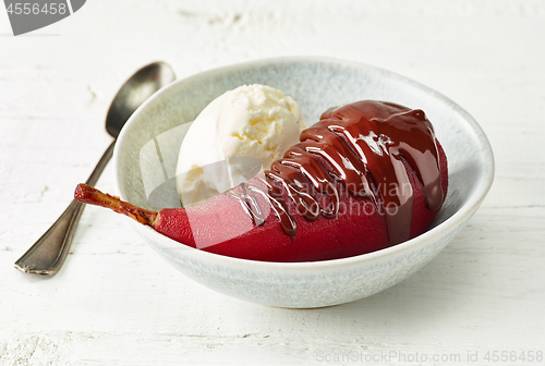 Image of Pear poached in red wine