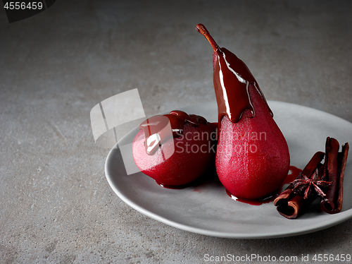 Image of Pears poached in red wine