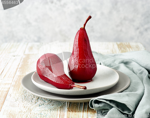 Image of Pears poached in red wine