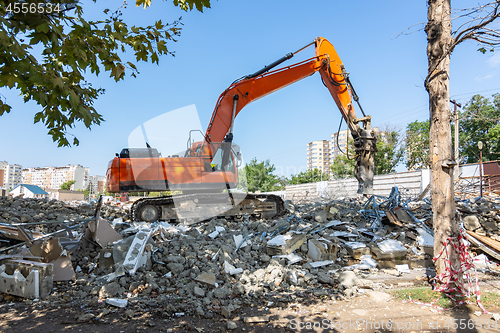 Image of Demolition of a building with a jackhammer