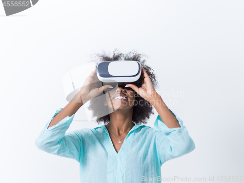 Image of black girl using VR headset glasses of virtual reality