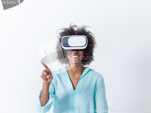 Image of black girl using VR headset glasses of virtual reality