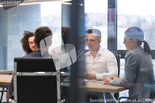 Image of Startup Business Team At A Meeting at modern office building
