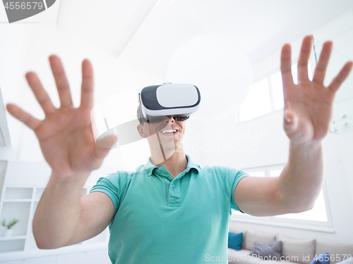 Image of man using VR-headset glasses of virtual reality