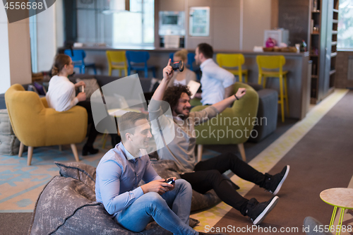 Image of startup Office Workers Playing computer games