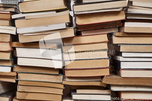 Image of Wall of books piled up