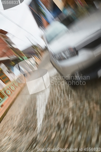 Image of Careless street crossing car accident