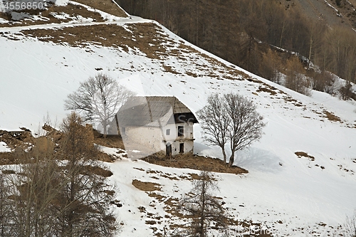 Image of Ruined mountain house in winter