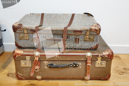 Image of Vintage suitcases on the floor