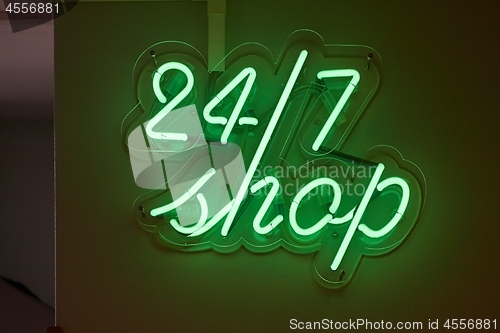 Image of Twenty-four seven shop sign