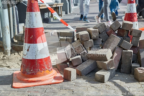 Image of Urban construction site with cone