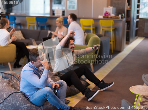 Image of startup Office Workers Playing computer games