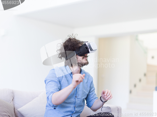 Image of man using VR-headset glasses of virtual reality