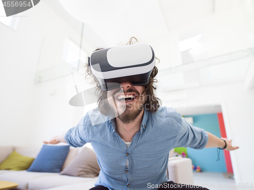 Image of man using VR-headset glasses of virtual reality