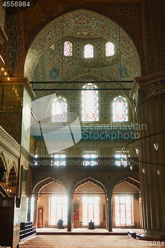 Image of male Muslim praying in the mosque